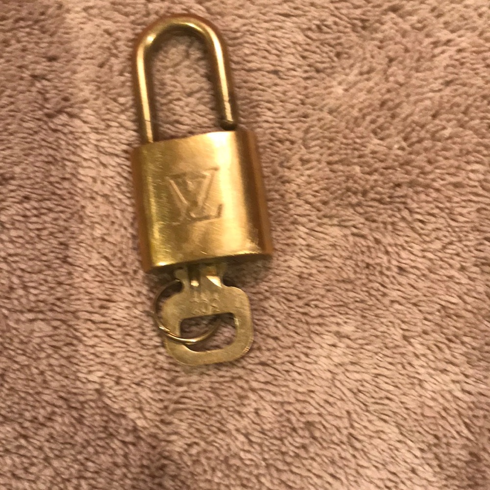 Authentic Louis Vuitton lock and key